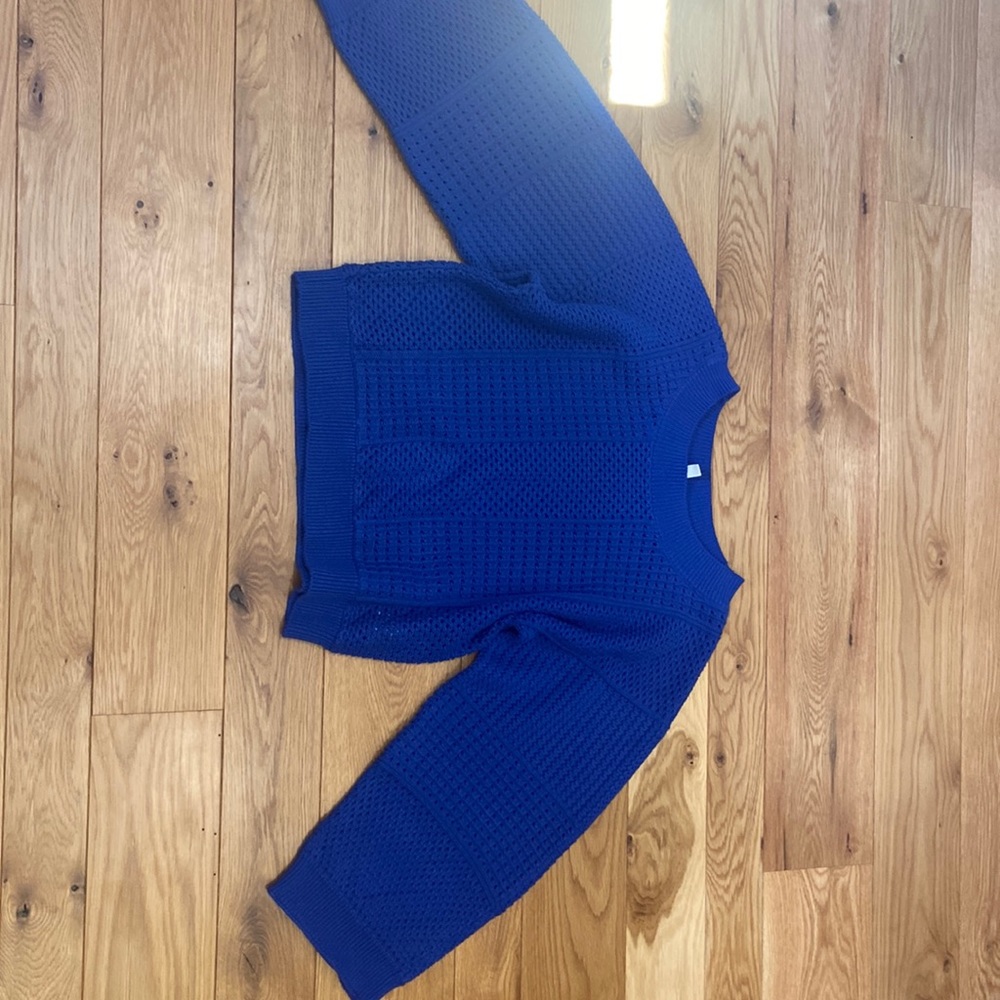 Selling dark blue sweater. Only worn a couple times. Recently dry cleaned.
